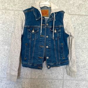 Levis Jean jackets. Sleeves are sweater material.